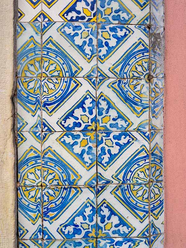 Blue and yellow tiles azulejos in Lisbon, Portugal