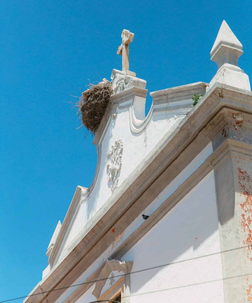 White church against a blue sky in the Algarve, Portugal