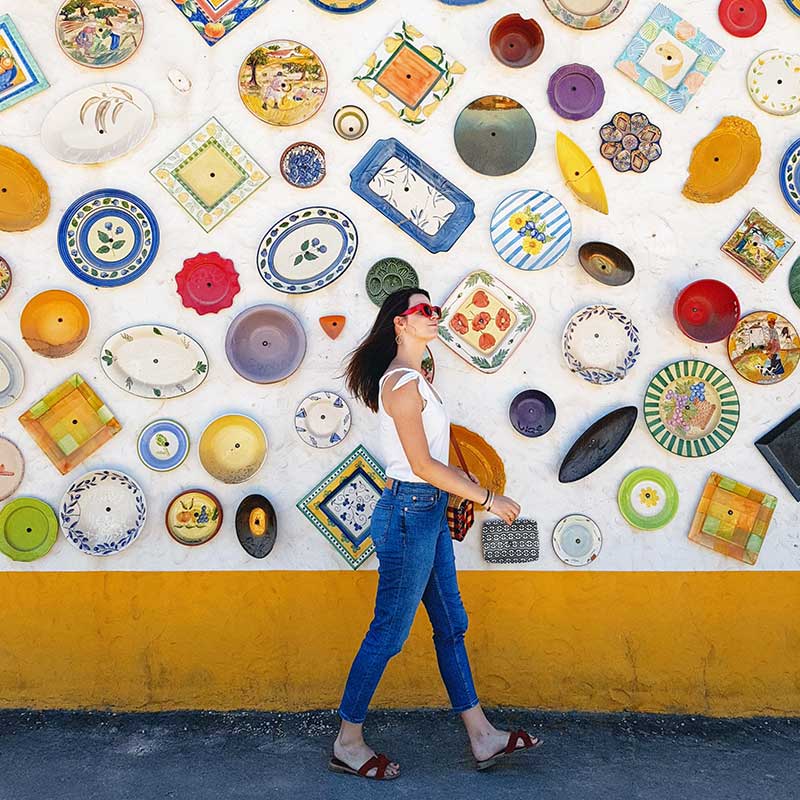 Daniela at Ceramica Paraiso wall of ceramics, Algarve, Portugal