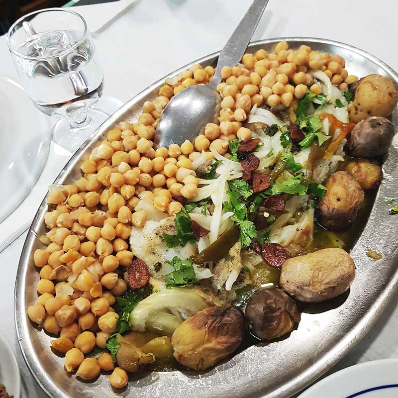 Baked codfish at Ze de Mouraria restaurant, Lisbon