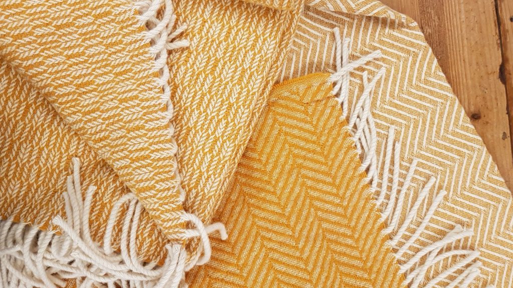Yellow woollen Burel blankets, made in Portugal