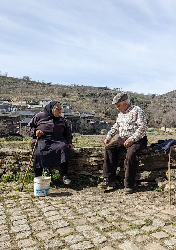 Rio de Onor is one of the most beautiful and most unique villages in Portugal. Two villagers talking