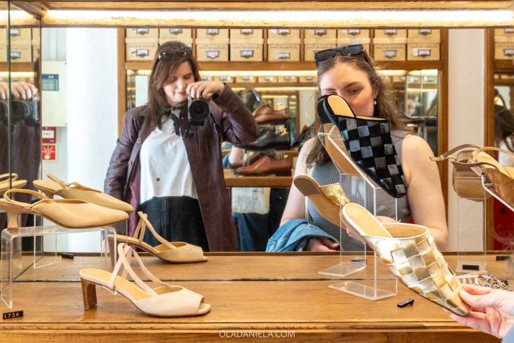 Selfie in the mirror of sapataria carmo shoe store in Lisbon